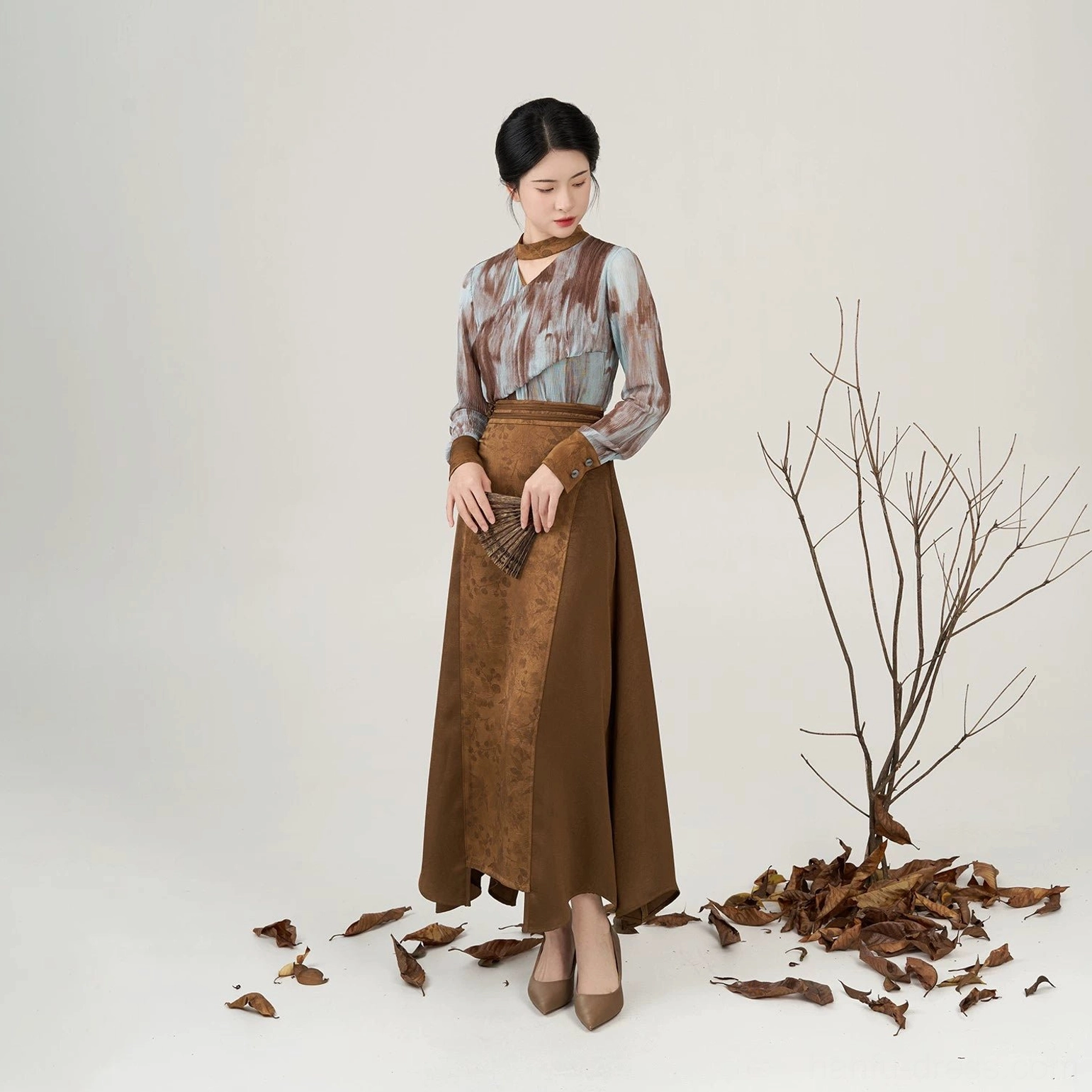 Full body view of Luotong Pass Modern Hanfu tie-dye long sleeve top and asymmetrical brown skirt set