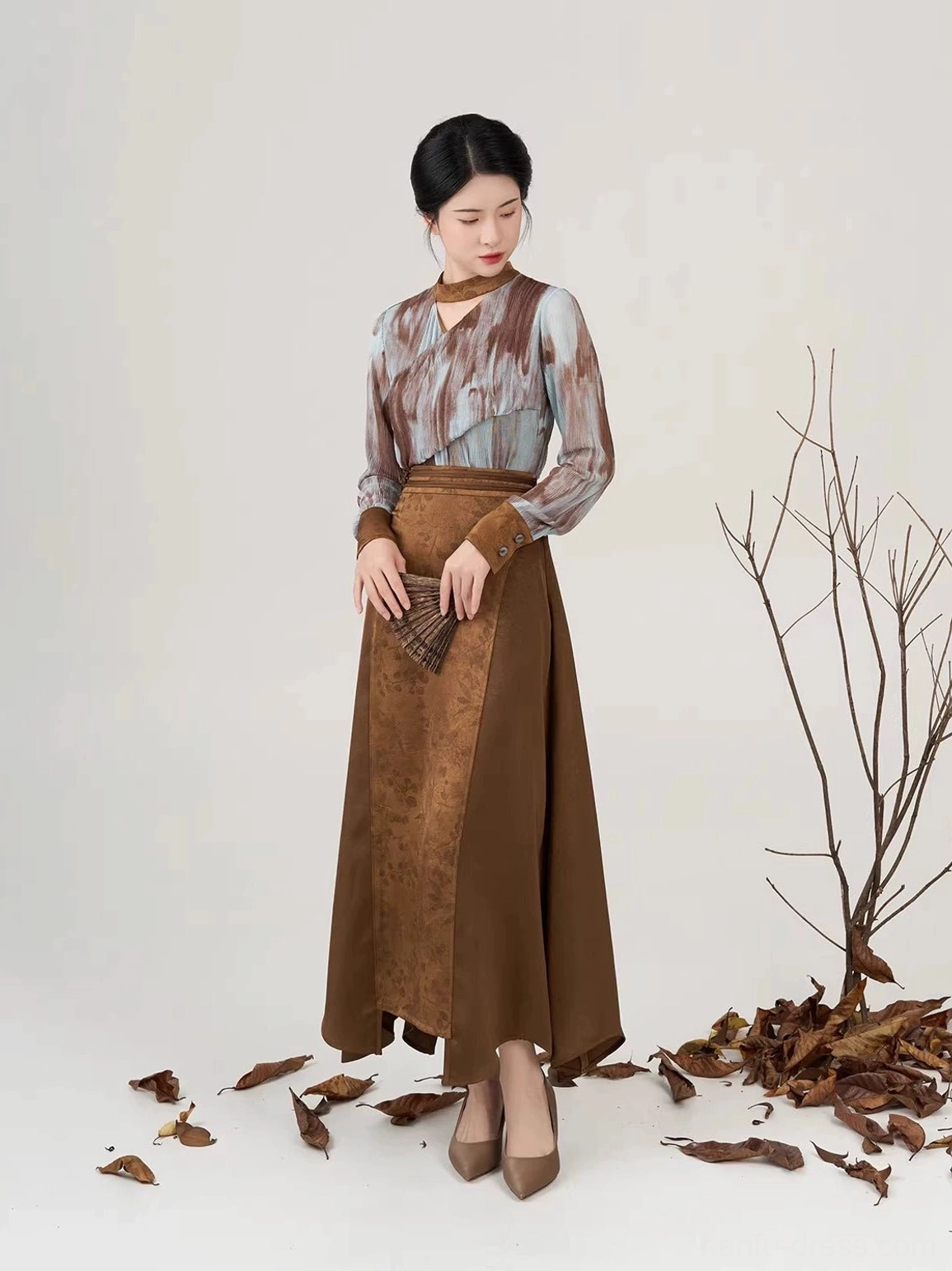 Luotong Pass modern Hanfu two-piece set with tie-dye long sleeve top and brown asymmetrical skirt front view