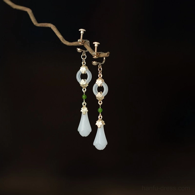 Comfort clip-on magnolia Chinese earrings for non-pierced ears with white flower drops green beads jade-look charms and antique gold-toned details