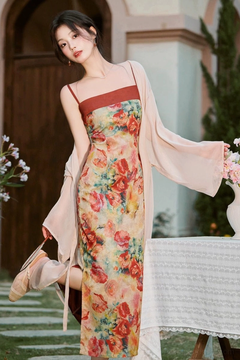Close-up of feminine modern Hanfu two-piece set featuring fitted floral slip dress and airy wide sleeve outer cardigan
