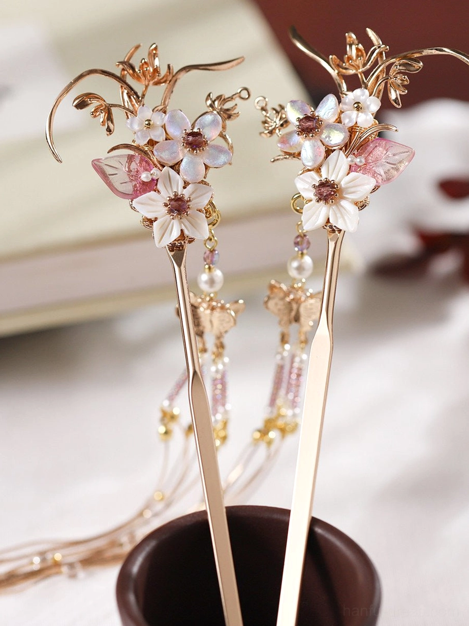 Matching pair of Chinese hair sticks with floral decorations, gold-toned shafts, and short beaded ornaments for traditional hairstyles
