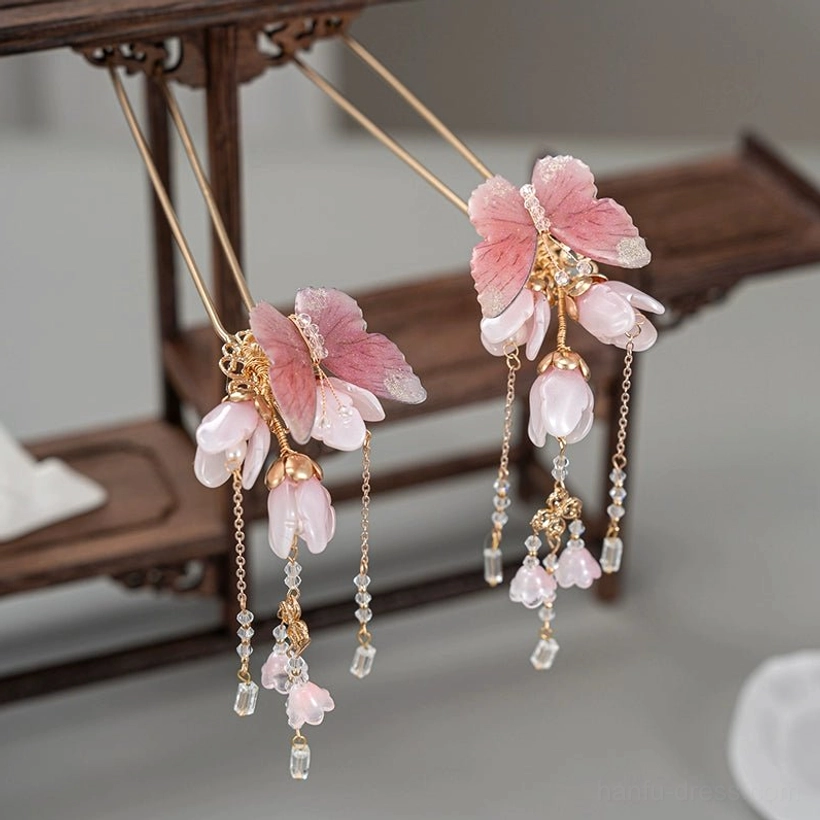 Matching pair of pink magnolia butterfly Chinese hair sticks with symmetrical floral decorations and crystal tassels