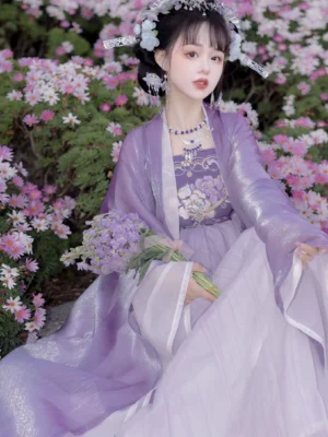 Mauve Tang Dynasty Hanfu Heziqun dress seated front three-quarter view with embroidered floral bodice and wide flowing sleeves