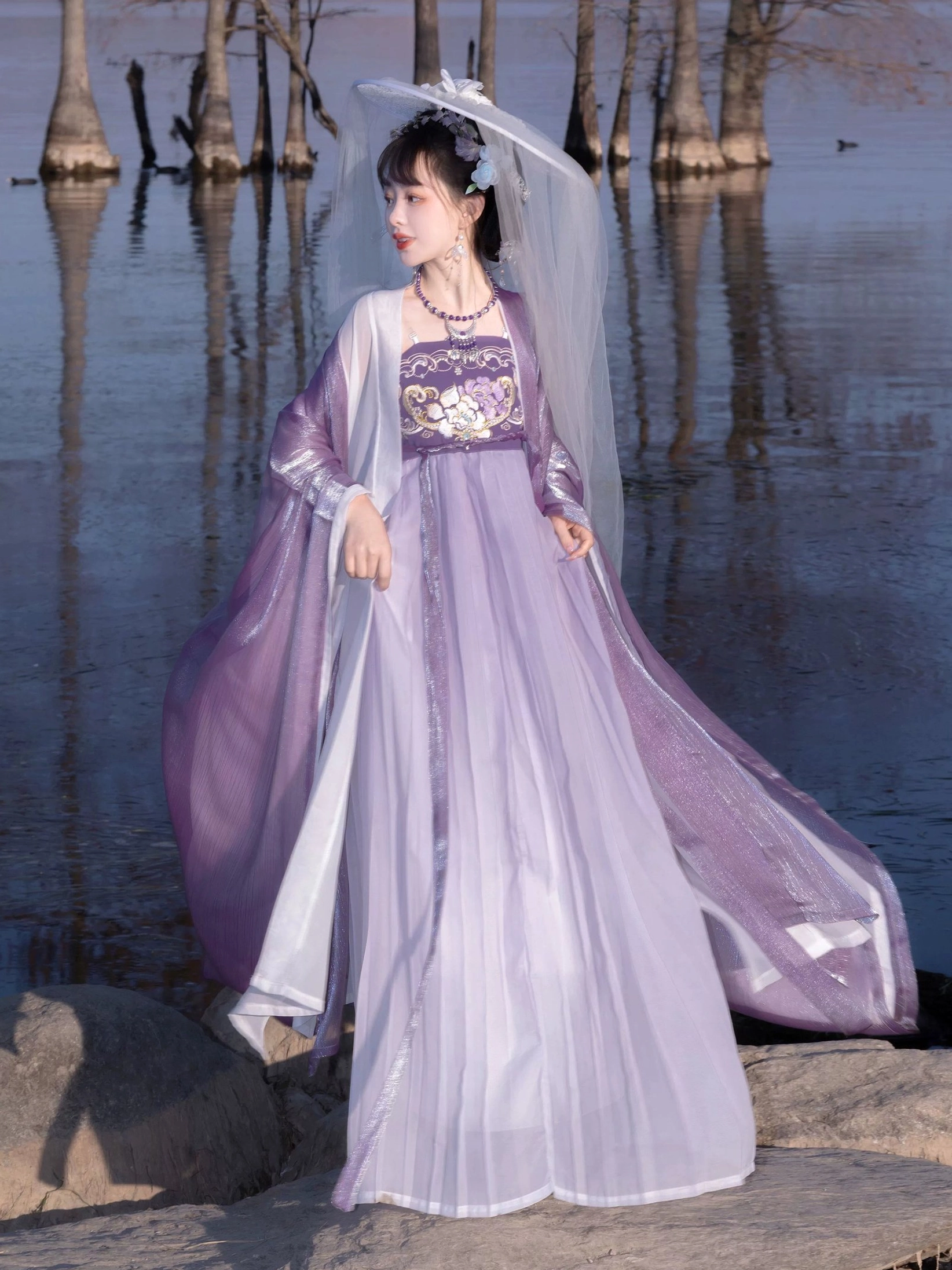Mauve Tang Dynasty Hanfu Heziqun side view showing pleated long skirt flowing train sheer veil and white contrast trim