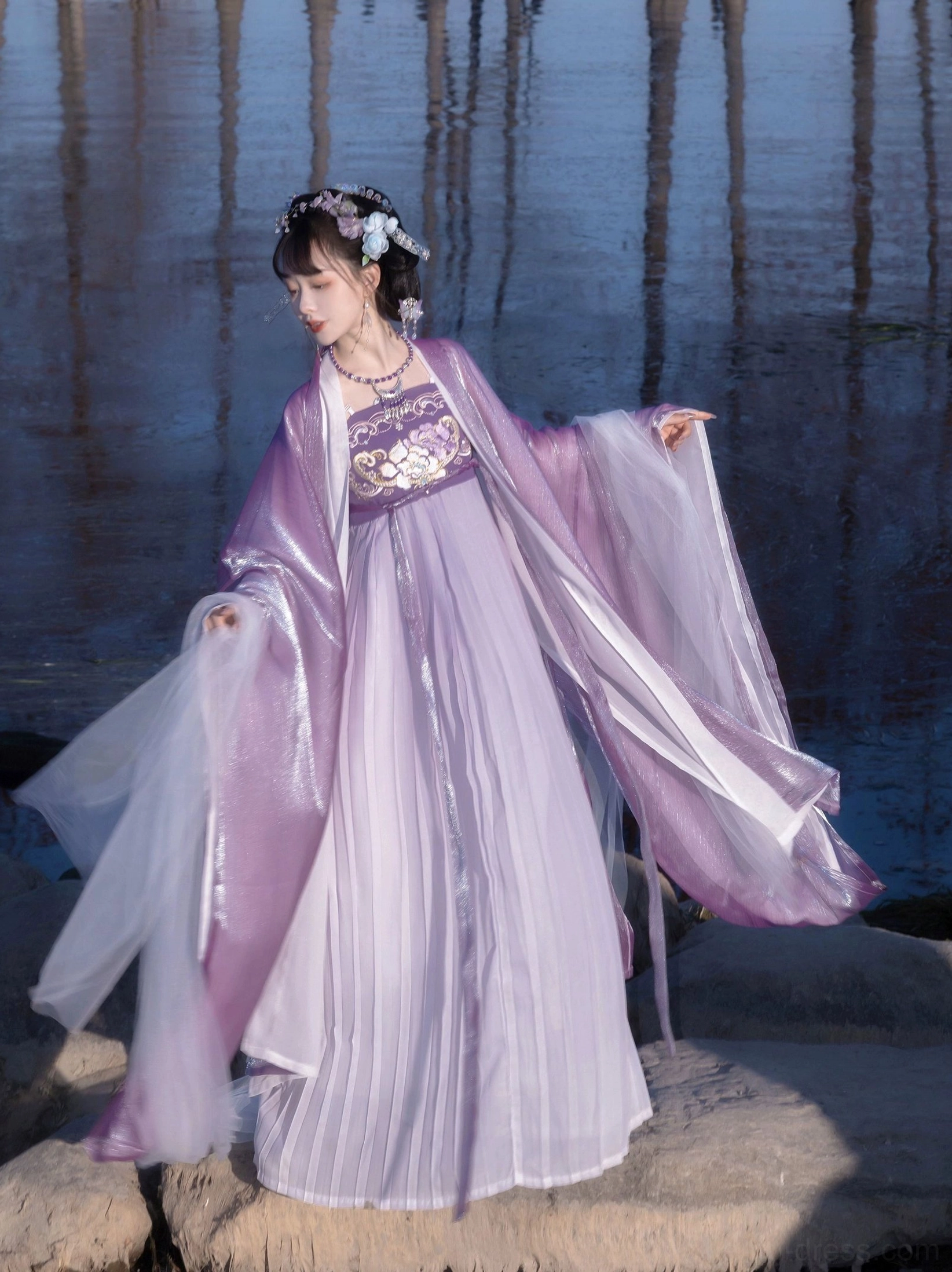 Mauve Tang Dynasty style Hanfu Heziqun side full length view highlighting wide outer sleeves pleated hem and layered fabric