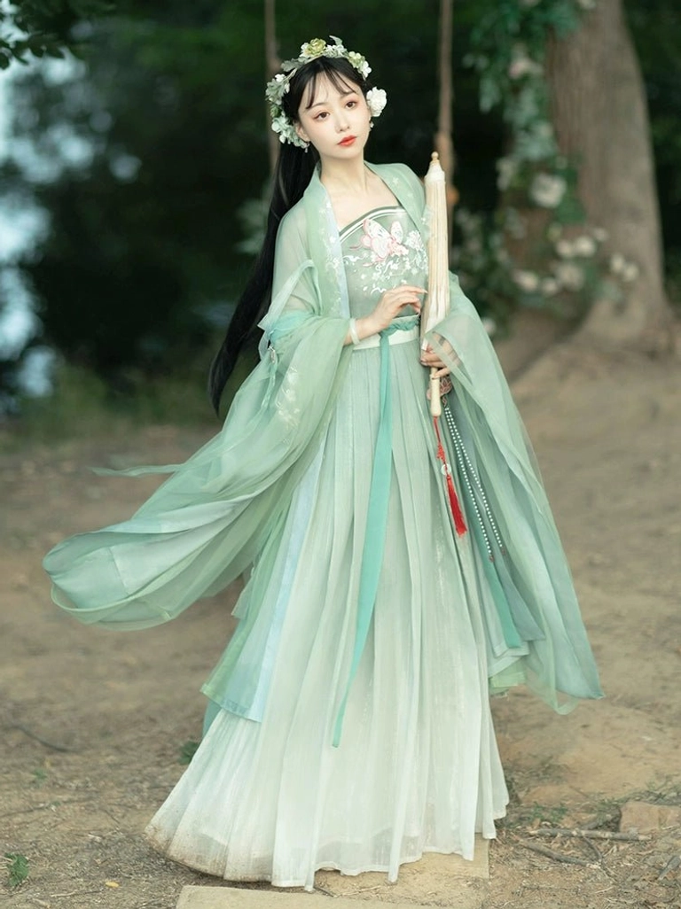 Cyan gradient Tang Dynasty Hanfu qiyao ruqun with floral embroidery waist sash and flowing outer robe styled with a folding fan