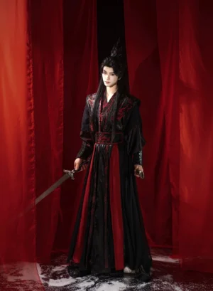 Men’s Chinese fantasy hanfu costume with layered black and red robes, embroidered waist detail, wrist guards, and traditional sword styling