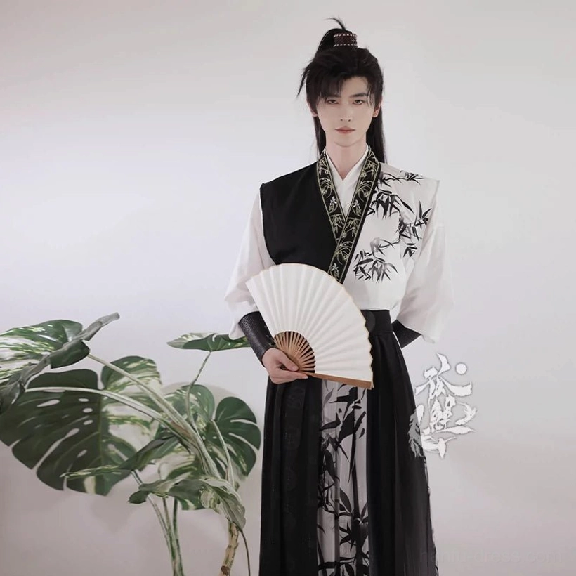Men's Hanfu wuxia half-set featuring a bamboo ink print cross-collar top, black vest, and black-and-white patterned wrap skirt