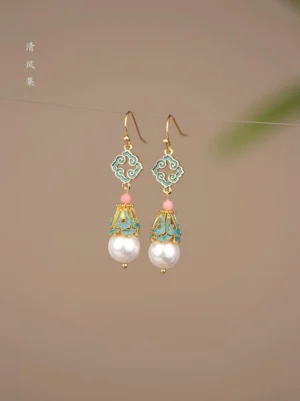 Pair of traditional Chinese Hanfu earrings with gold toned cloud ornaments colorful enamel accents and white pearl drops