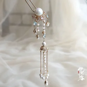 Classical Chinese pearl tassel hairpin with gold-tone floral setting, large white pearl, light blue accents, and layered dangling chains on cream silk