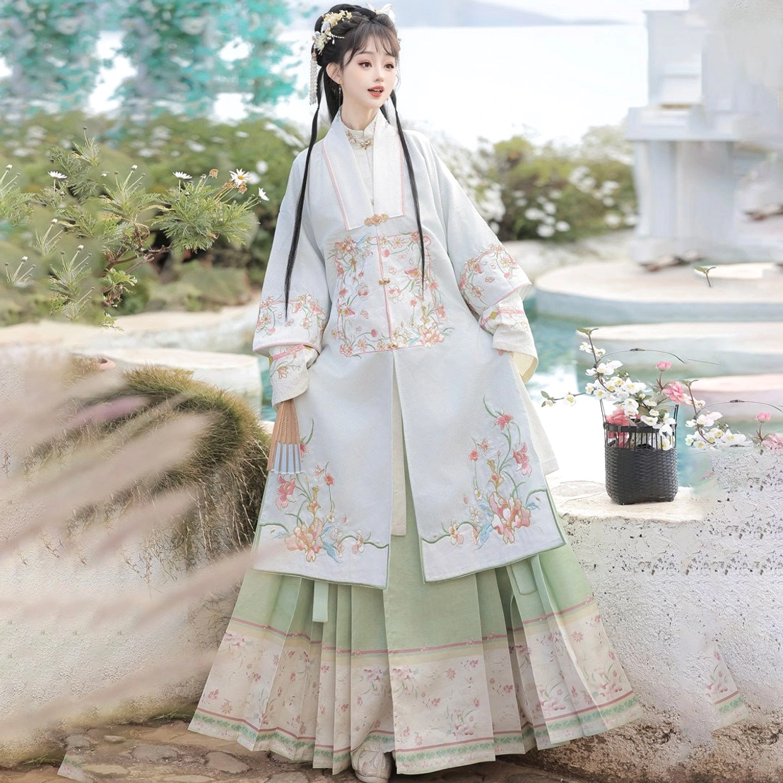 Blue Ming Dynasty Hanfu full set with floral embroidered square-collar robe and green layered pleated mamian skirt front view