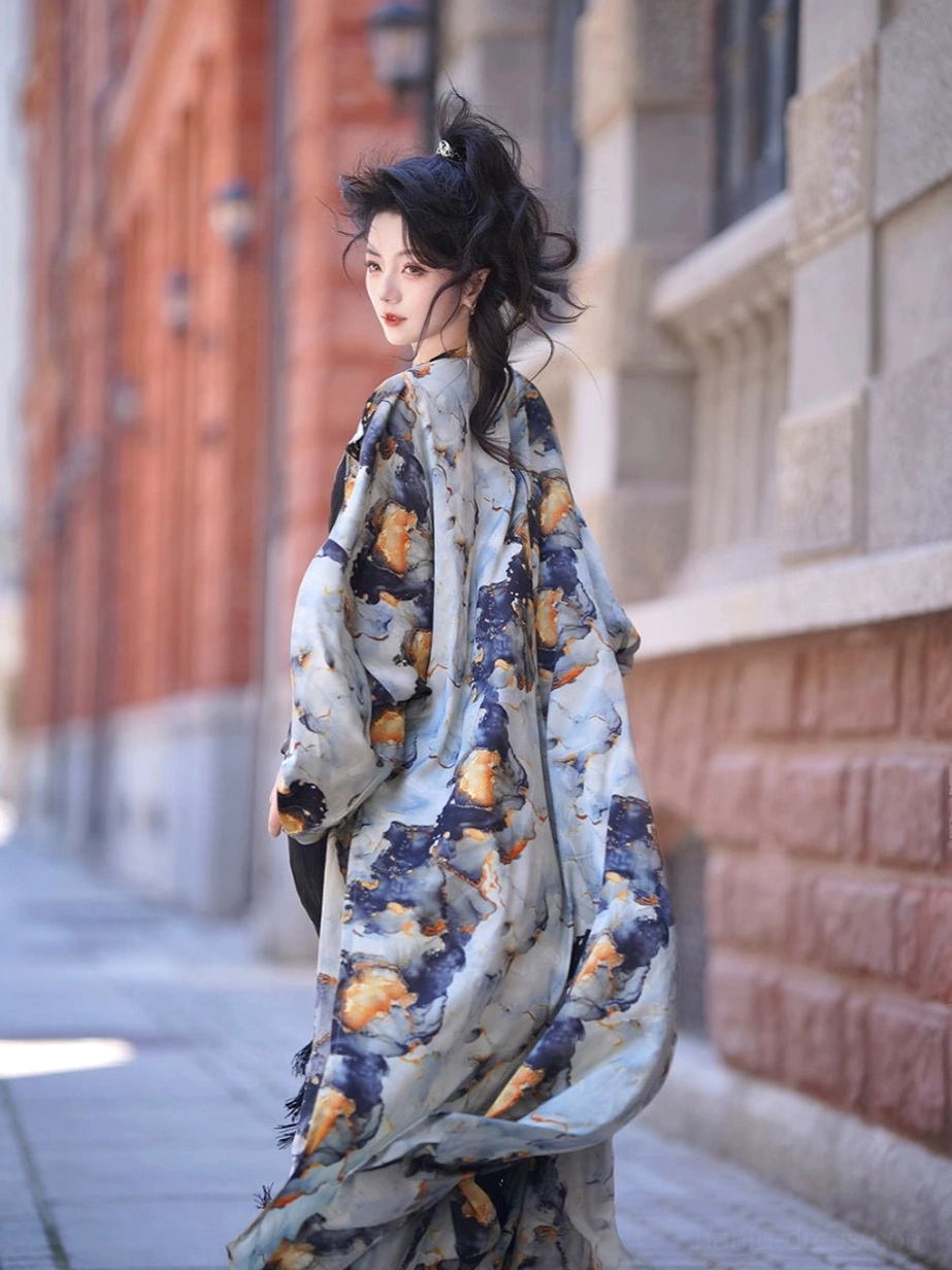 Back view of the floor-length Midsummer Tang inspired Hanfu robe showing the flowing oversized silhouette and abstract ink-wash design