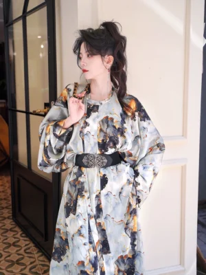 Three-quarter side view of the gender-neutral Midsummer Tang inspired Hanfu robe featuring abstract ink-wash print and wide sleeves