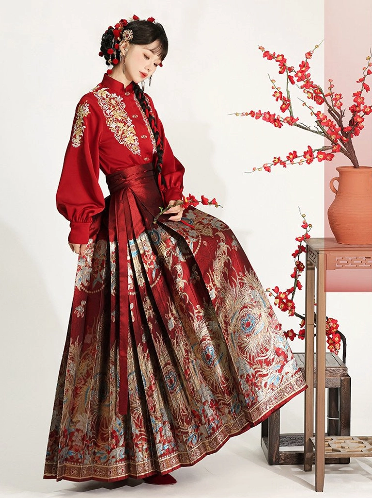 Ming Dynasty Chinese New Year Hanfu dress in red with embroidered stand collar top and ornate red mamian skirt shown in side profile