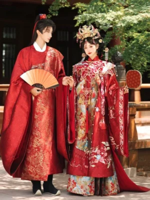 Ming Dynasty Chinese wedding Hanfu couple set in a classical garden courtyard, featuring an embroidered phoenix and qilin bridal gown with trailing skirt and formal red groom robe