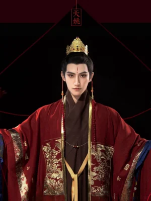 Close-up of Ming Dynasty inspired men's hanfu with gold dragon chest embroidery yellow tie and traditional crown