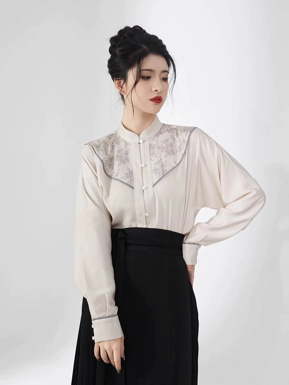 Beige stand-collar long sleeve Hanfu blouse paired with high-waisted black Ming Dynasty mamianqun skirt
