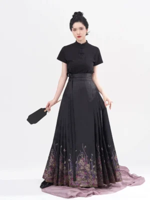 Front view of black Chinese stand collar short sleeve Hanfu blouse with floral purple mamian skirt and handheld fan