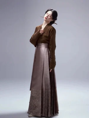Front view of elegant Ming Dynasty Hanfu outfit with brown blouse and pleated mamian skirt