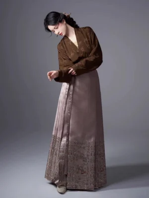 Ming Dynasty Hanfu brown jacquard blouse and taupe embroidered mamian skirt three quarter side view