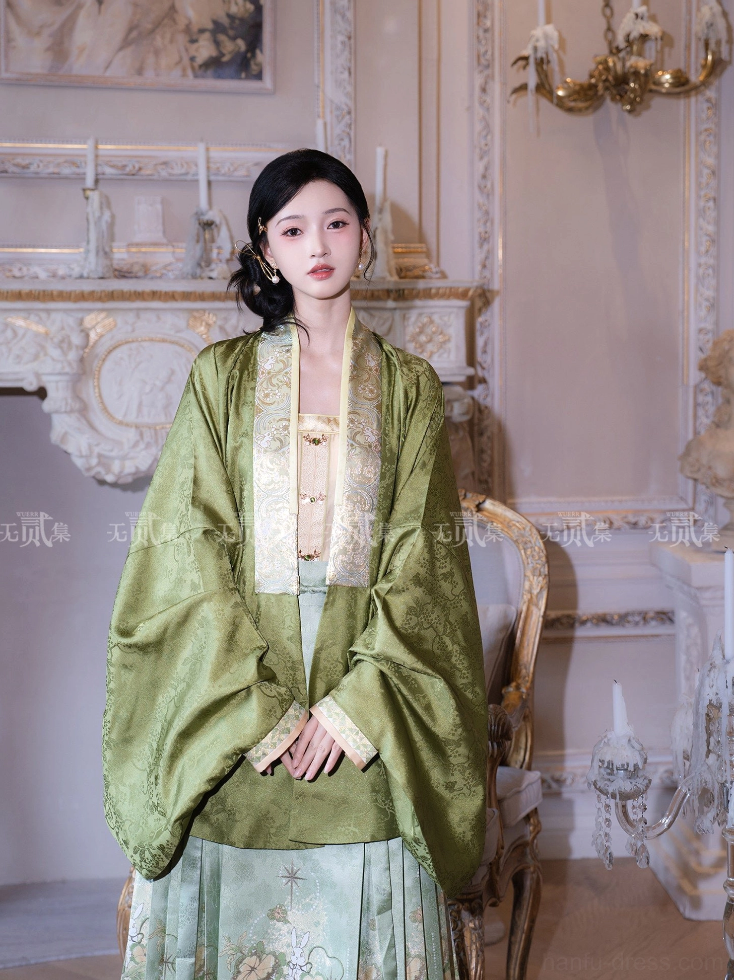Close up of Ming Dynasty Hanfu upper body showing woven gold cardigan collar trim light camisole and decorative front metal buttons