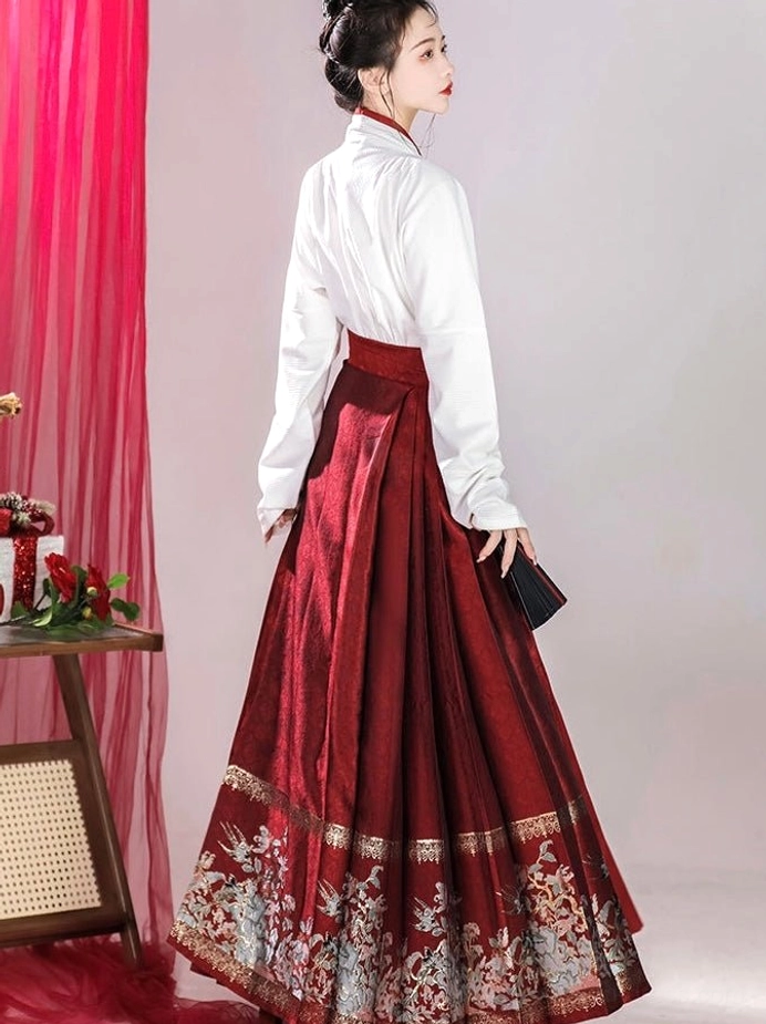 Ming Dynasty Hanfu set with embroidered mamianqun horse face skirt and cross-collar top product detail view