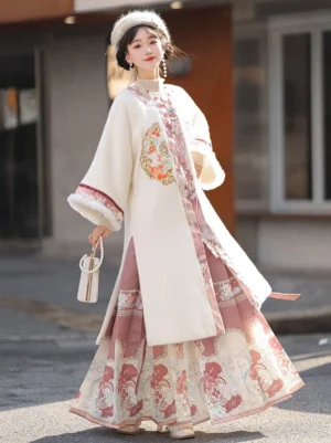 Ming Dynasty Hanfu fleece robe and pink floral mamian skirt set shown in full side view outdoors