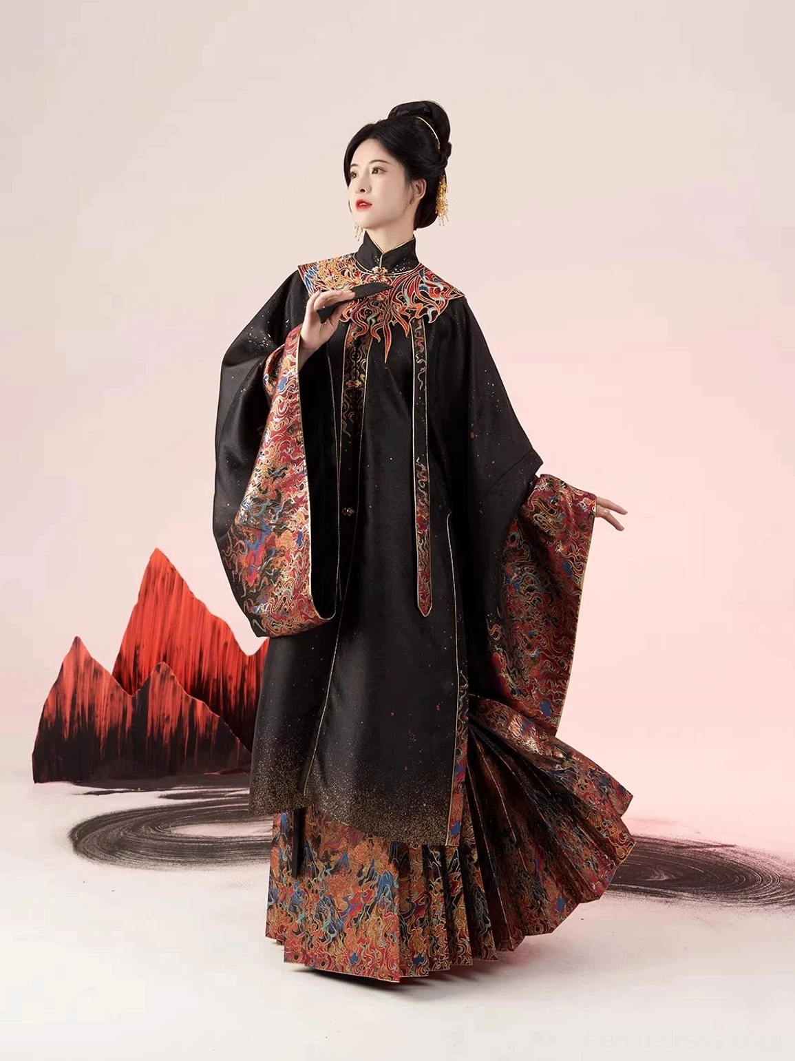 Three-quarter front view of a Ming Dynasty Hanfu full set with detachable fire-inspired cloud collar, black robe, crimson details, and matching brocade accents