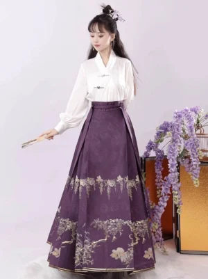 Ming Dynasty-inspired modern Hanfu mamianqun complete set with white cross-collar blouse, purple horse face skirt, golden wisteria floral patterns, and traditional Chinese styling
