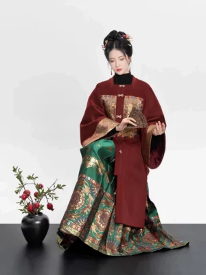 Ming Dynasty Hanfu full set with deep red square collar coat, green Dunhuang brocade mamian skirt, gold trim, and traditional Chinese styling