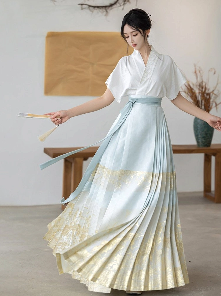 Ming Dynasty Hanfu outfit with white cross-collar flare sleeve top and light blue gold gradient mamianqun skirt