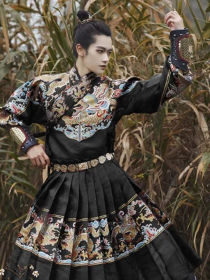 Black Ming Dynasty Jinyiwei Feiyufu dragon robe for men shown in left three-quarter view outdoors with embroidered dragon motifs, belt, and arm bracers