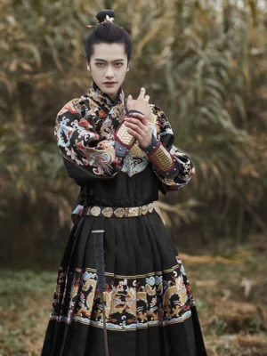 Front view of black Ming Dynasty Jinyiwei Feiyufu hanfu for men featuring ornate dragon embroidery, structured belt, and matching arm bracers