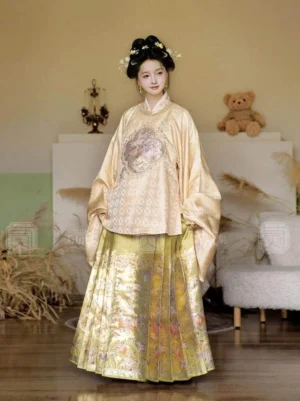 Ming Dynasty Thousand Golden Rays Hanfu set with champagne round collar top and golden brocade mamian skirt full front view
