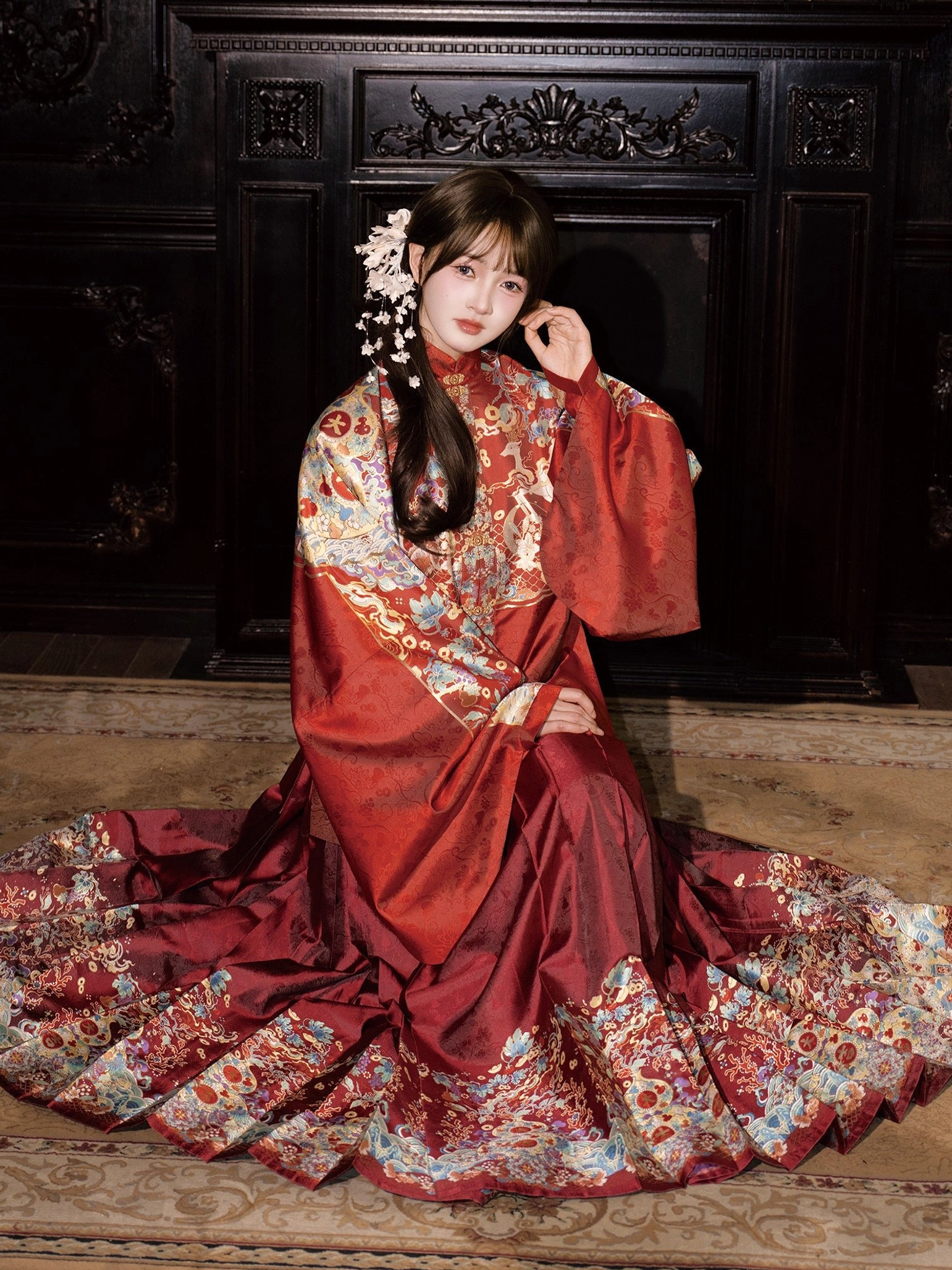 Full red Ming Dynasty wedding Hanfu with fitted embroidered pipa sleeve top and flowing pleated mamian skirt