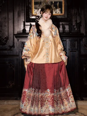 Champagne gold Ming Dynasty Hanfu pipa sleeve top paired with a red embroidered mamian skirt for a Chinese wedding look