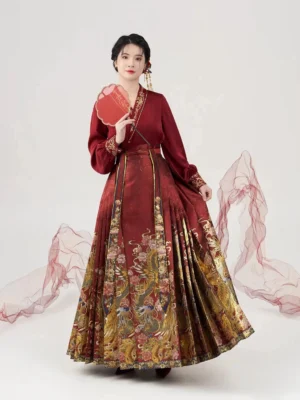 Ming Dynasty wedding Hanfu outfit in a front three-quarter view with a red folding fan and golden phoenix dragon Mamian skirt patterns