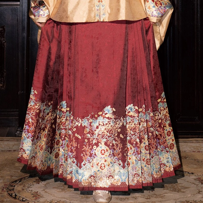 Red pleated mamian skirt for Ming Dynasty wedding Hanfu with elaborate auspicious floral embroidery along the hem