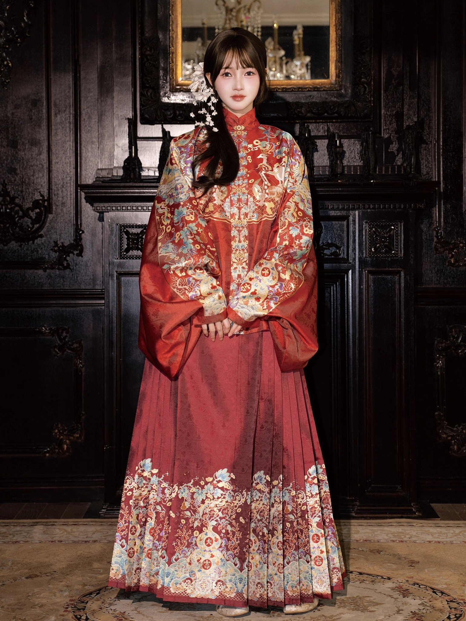 Red Ming Dynasty wedding Hanfu with embroidered pipa sleeve top and red mamian skirt shown in a full-body front view