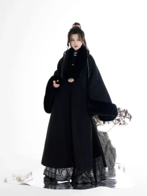 Full front view of black Ming Dynasty Wuxia Hanfu coat with faux fur collar and silver patterned mamian skirt hem
