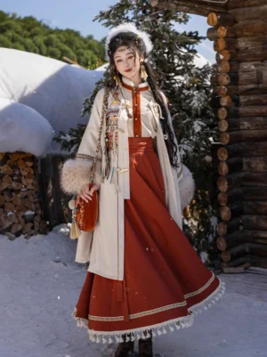 Front view of cream Ming Dynasty inspired Hanfu jacket with red trim, ethnic-inspired embroidery and winter styling