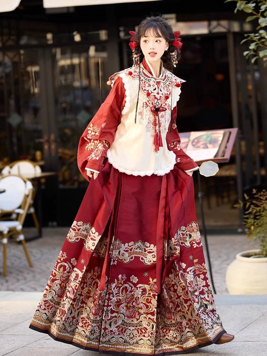 Back three-quarter view of a Ming-inspired Hanfu set featuring a wide flowing mamianqun horse-face skirt with traditional embroidery and dark hem trim