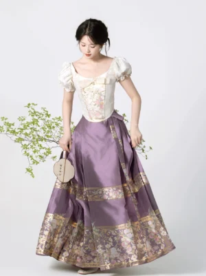 Ming Dynasty inspired modern Hanfu outfit with ivory embroidered puff sleeve corset and purple mamian horse face skirt with gold floral borders