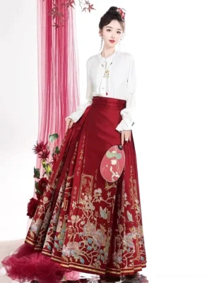Wine red Ming style mamianqun horse face skirt and white Hanfu blouse with gold hem trim, shown with round silk fan in side view