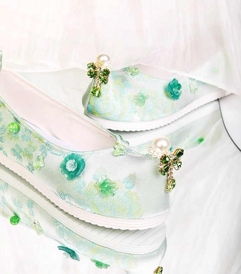Mint green floral dragonfly Chinese Hanfu platform shoes with pearl ornaments, canvas uppers and thick white rubber soles shown from side and overhead views