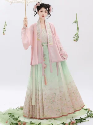 Full front view of mint green and pink Ming Dynasty Hanfu outfit with floral embroidery waist tassel and flowing mamian skirt