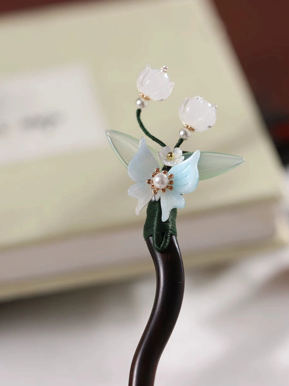 Traditional Chinese orchid and lily of the valley hair stick floral arrangement for Hanfu and qipao updos