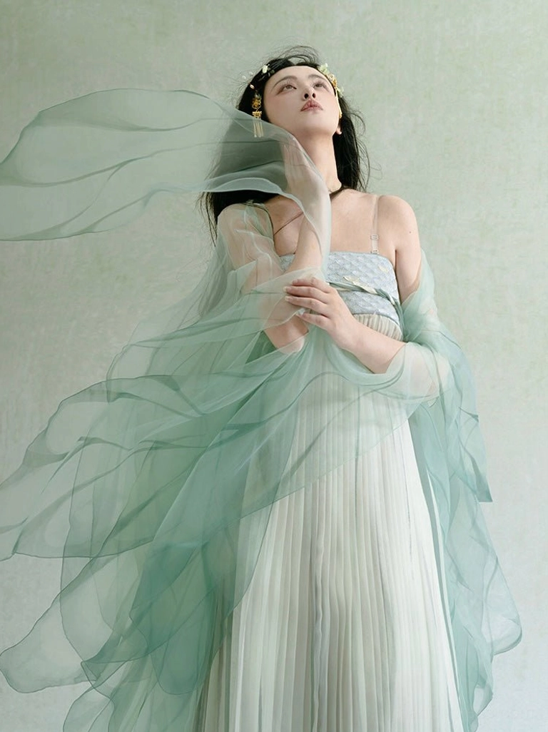 Mist Green and ivory Tang Dynasty Hanfu dress with sheer cyan chiffon shawl, pleated maxi skirt, and flowing ribbon details