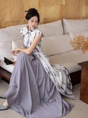 Misty Clouds tie-dye cheongsam modern Hanfu two-piece set worn in a vintage Chinese-style living room with a flowing lavender maxi skirt