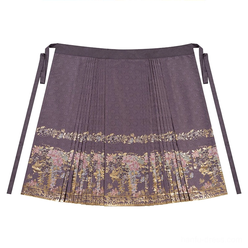 Flat lay of violet Ming Dynasty mamian skirt with pleated panels side tie straps and gold floral embroidery at hem